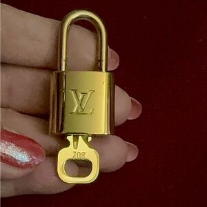 #302- Authentic LV key & lock